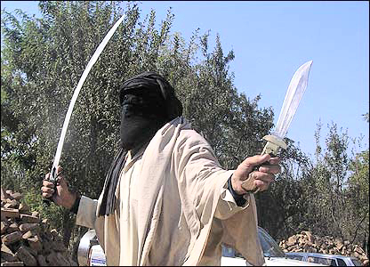 Taliban with swords